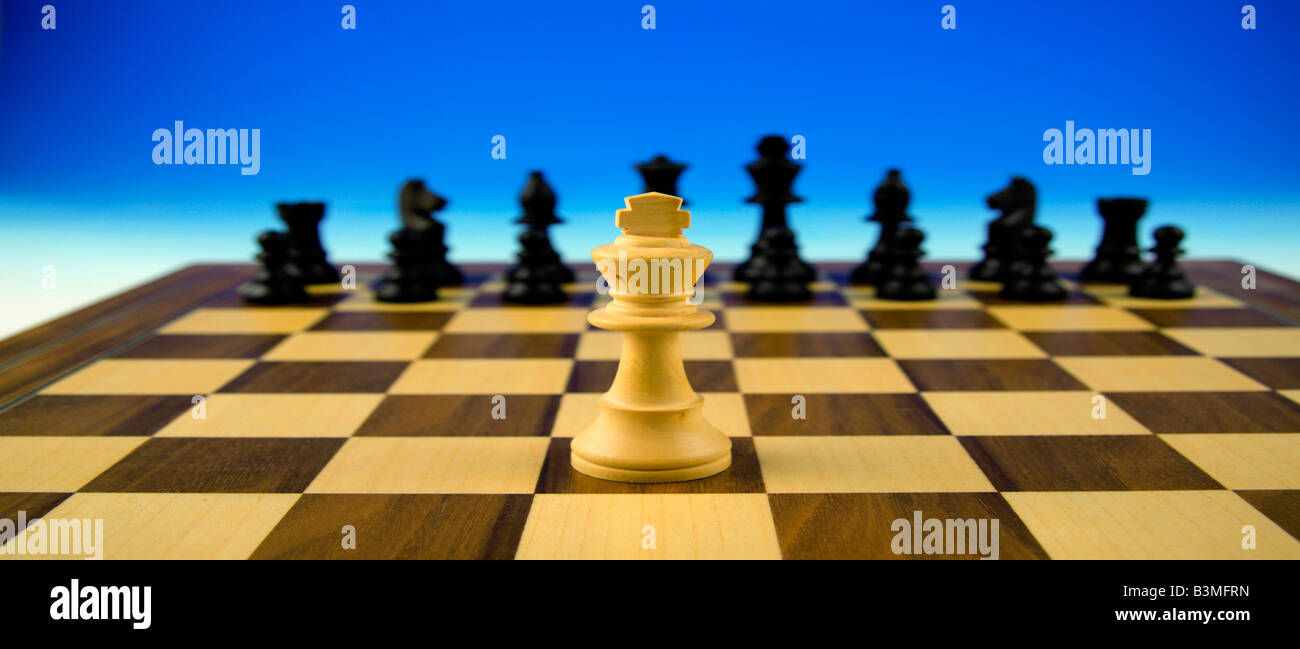 king on chessboard symbolism for strategy and its practicality in view of various interest groups Stock Photo