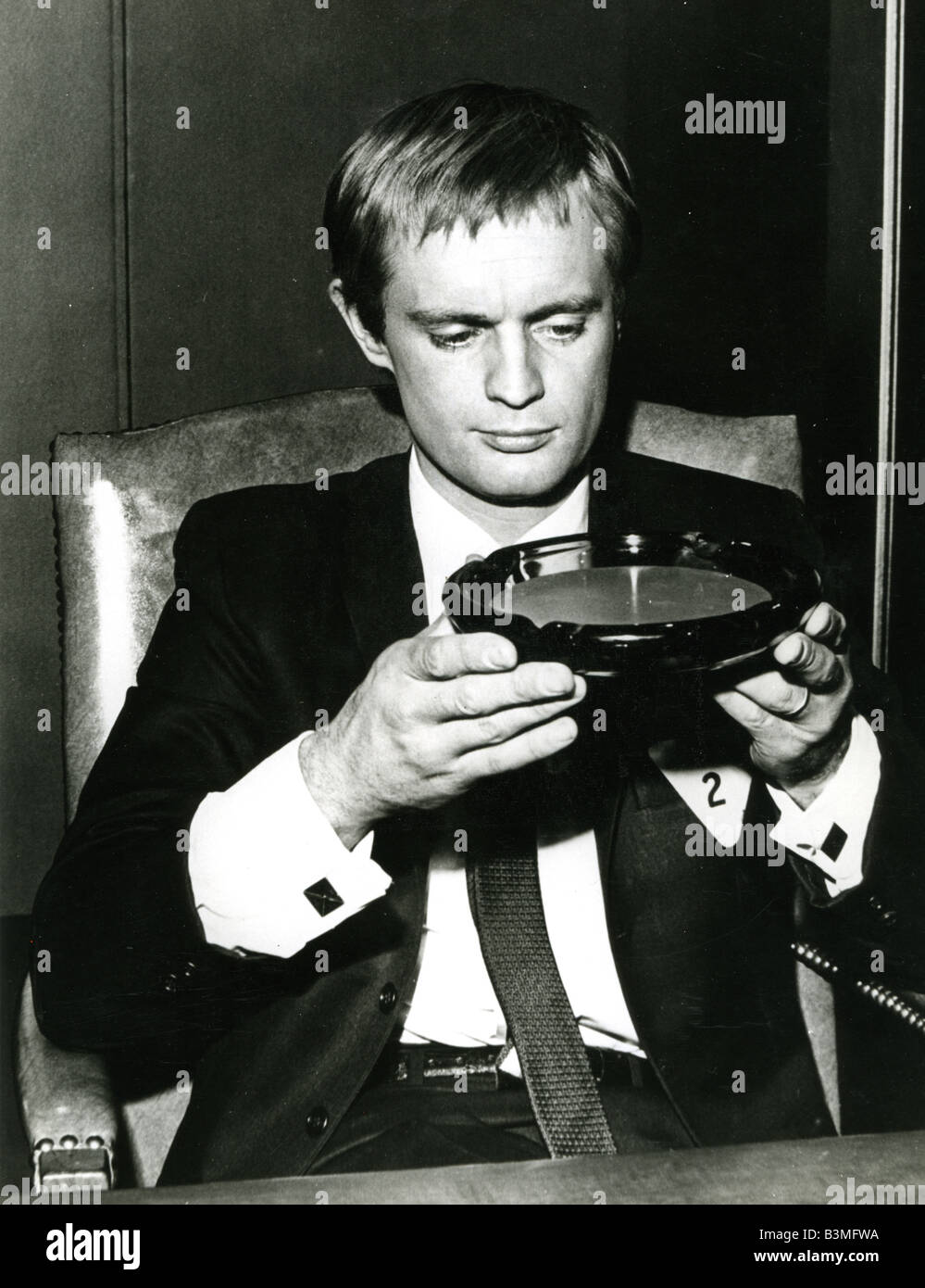 THE MAN FROM UNCLE David McCallum as Illya Kuryakin in the episode The Mad Mad Tea Party Affair Stock Photo