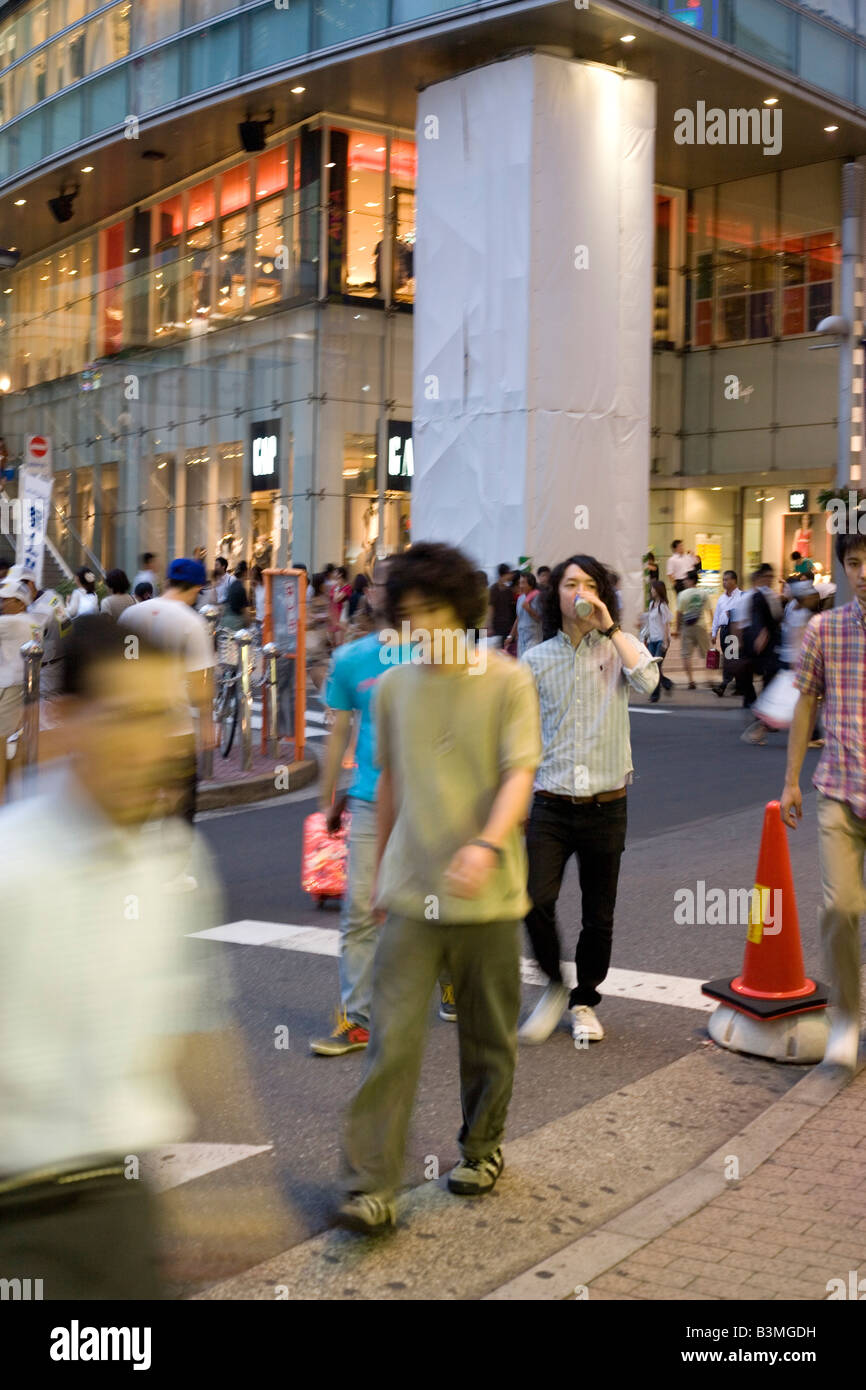 japanese people walking across the street in harajuku, tokyo Japan, urban city rush hour Stock Photo