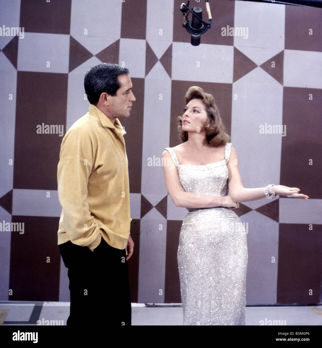 PERRY COMO with singer Julie London on his US TV show in the mid 1960s Stock Photo