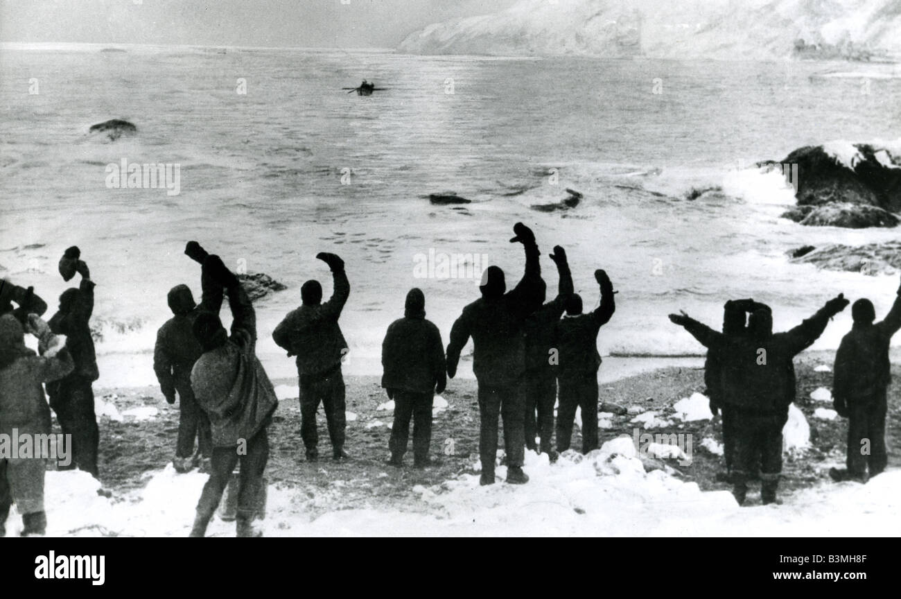 SIR ERNEST SHACKLETON : crew members wave to the supply boat Stancomb Wills at Elephant Island. Photo by Frank Hurley Stock Photo