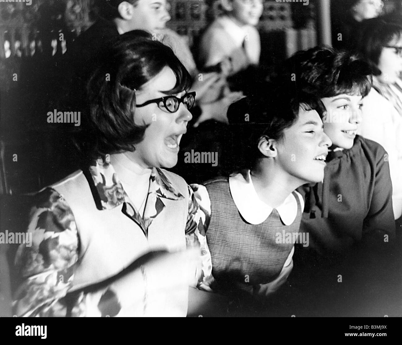 AMERICAN BEATLE fans at a 1964 concert in New York Stock Photo