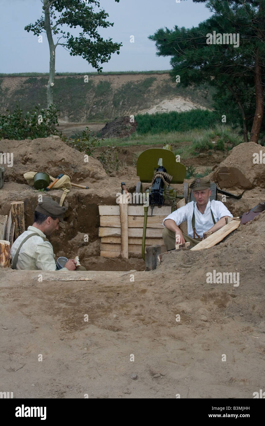 Scene from World War 2 Polish soldiers in trench resting and eating