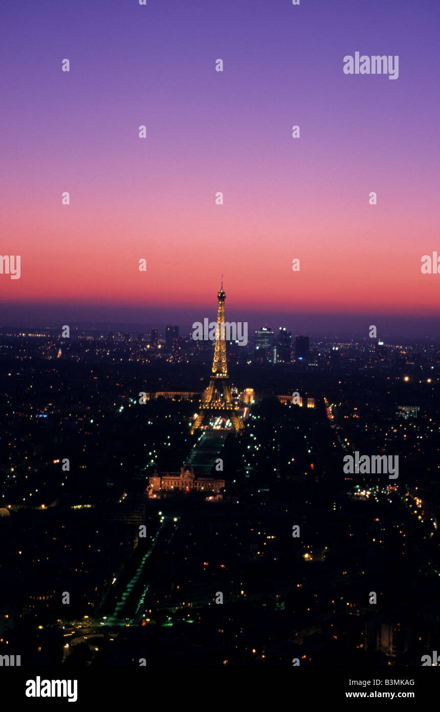France Paris The Eiffel Tower lights up the Paris skyline at sunset