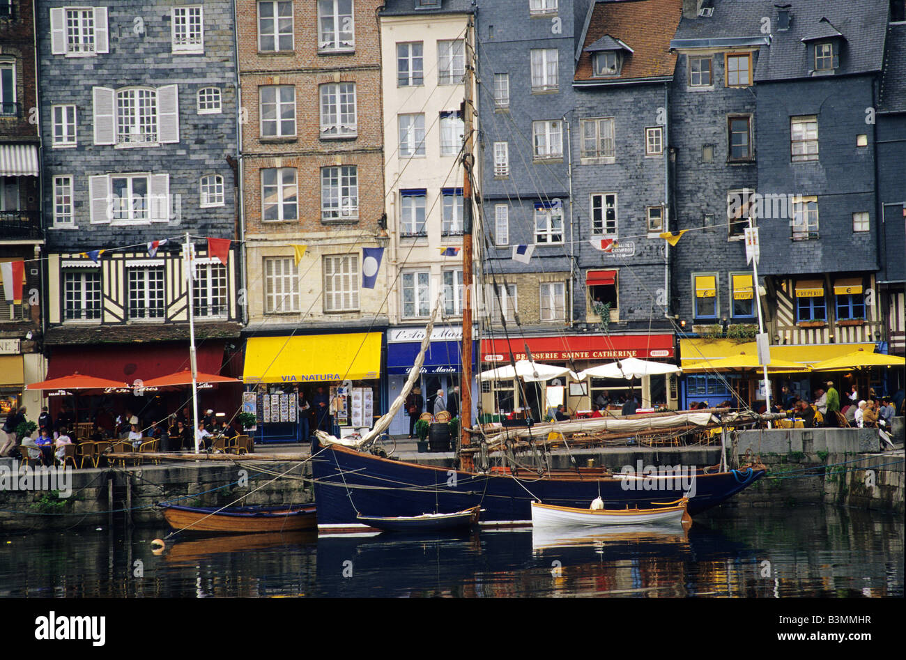 France Brittany Honfleur Cafes and boats at Vieux Bassin in Honfleur Stock Photo