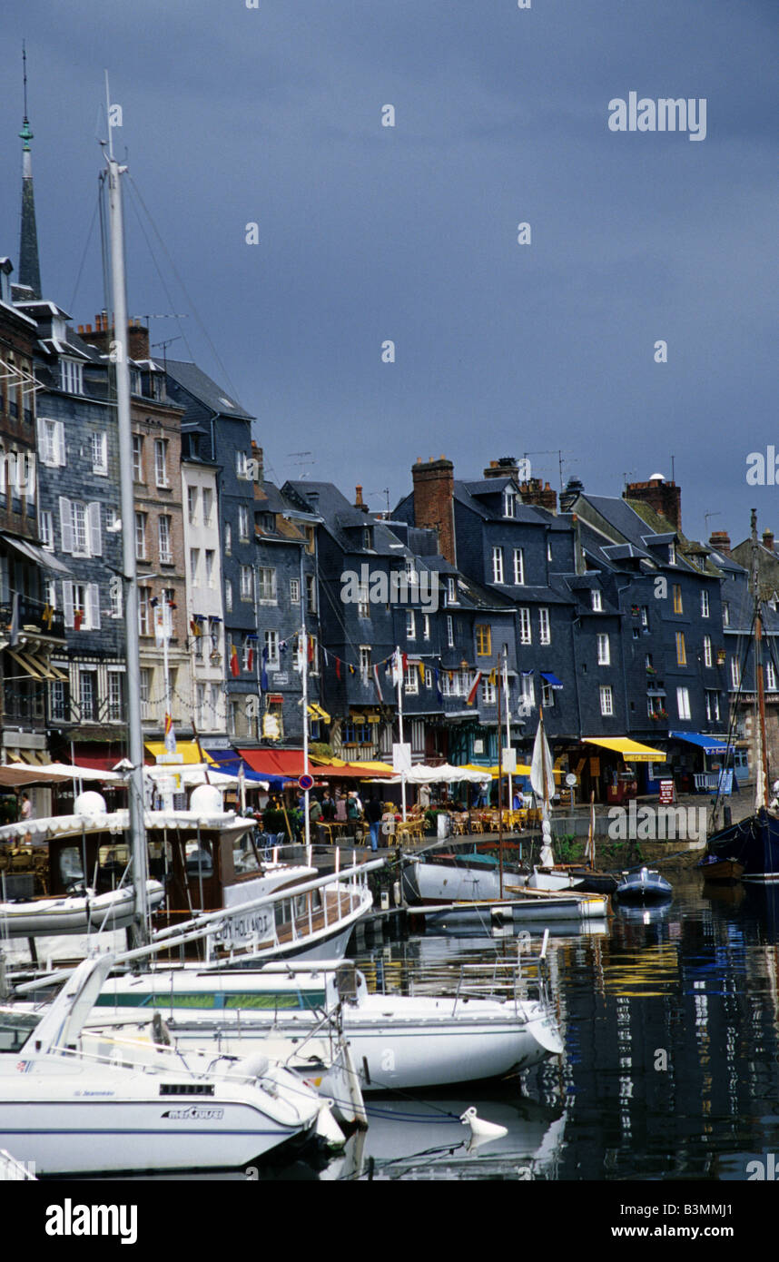 France Brittany Honfleur Boats and harbour side cafes at Vieux Bassin in Honfleur Stock Photo