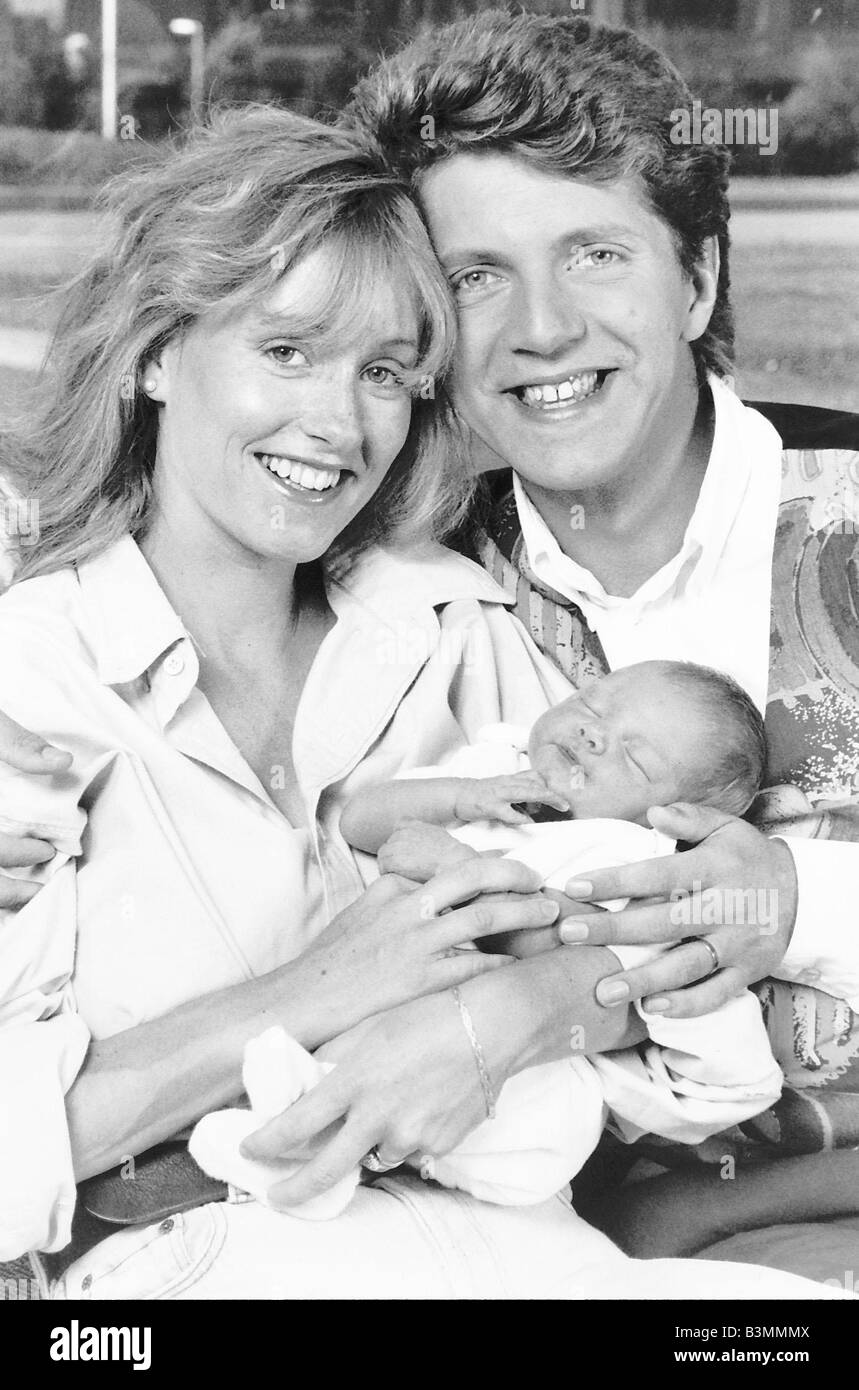 Neil Buchanan TV Presenter of Your Number Please with wife Nichola Buchanan and new born baby Molly Stock Photo