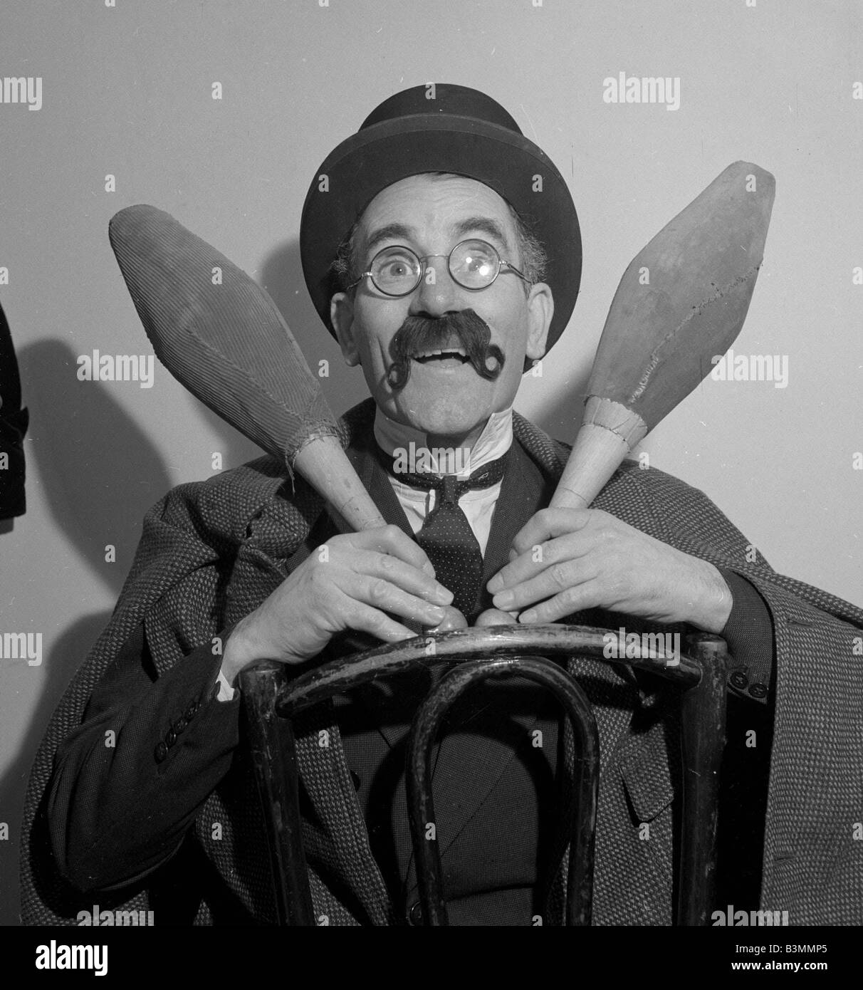 Comedian Eddie Gray seen here holding skittles wearing a false moustache Comic 1948 mirrorpix Stock Photo