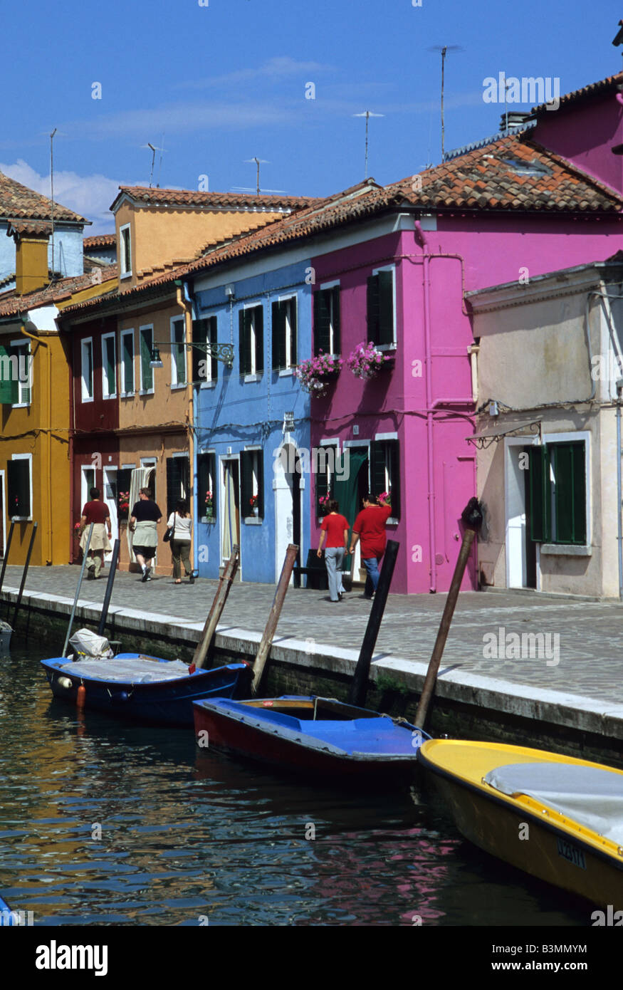 Italy Venice Colourful houses line a canal on the island of Burano near ...