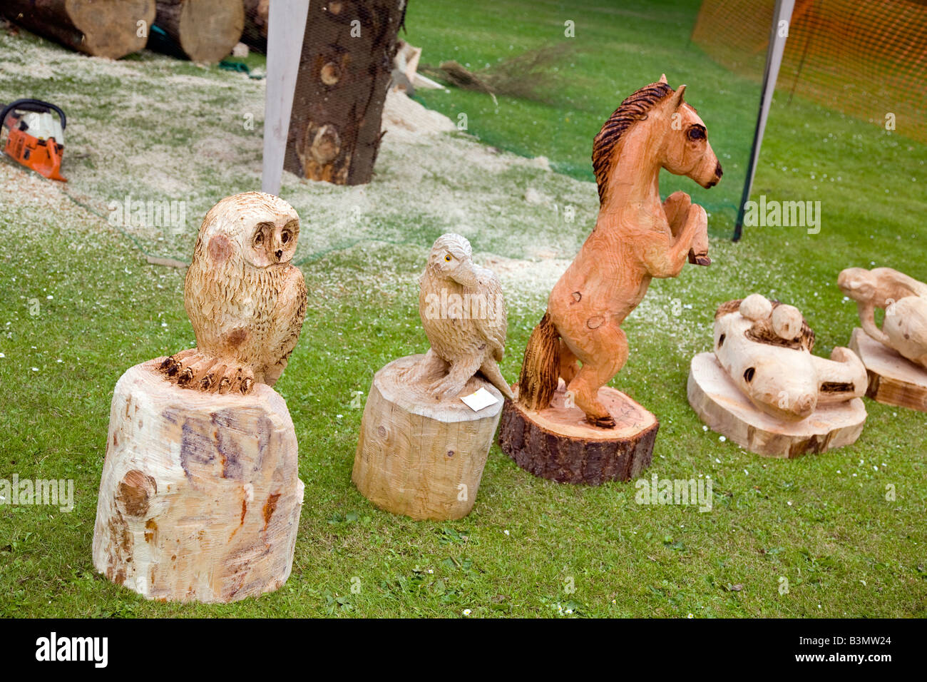 Wood carvings of owl, eagle and horse Stock Photo