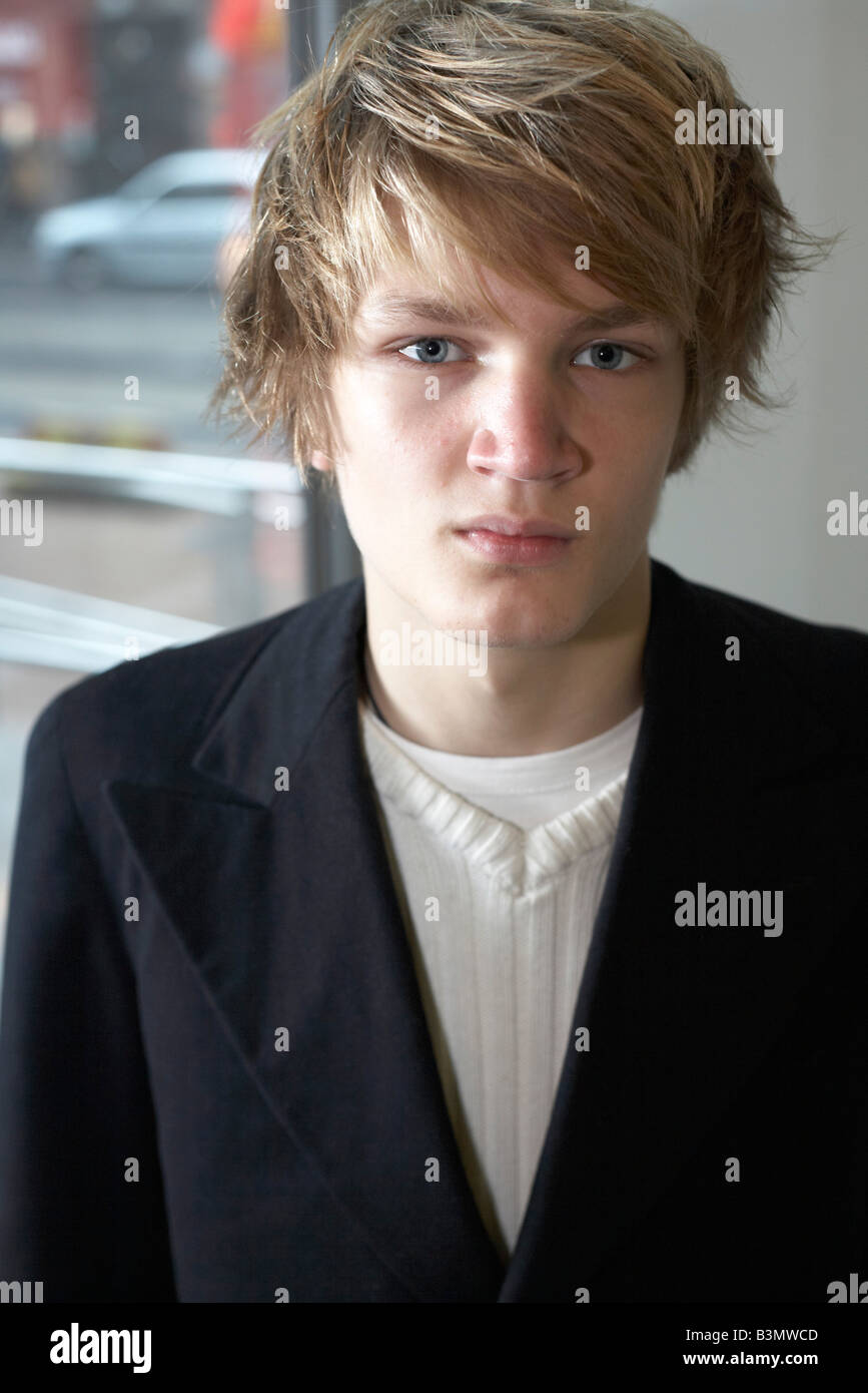 Portrait of teenage boy in urban environment, interior Stock Photo - Alamy