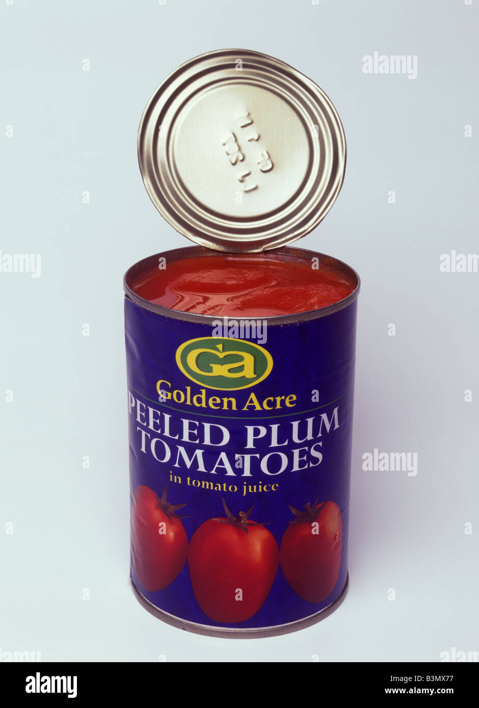 An open can of tomatoes Stock Photo Alamy