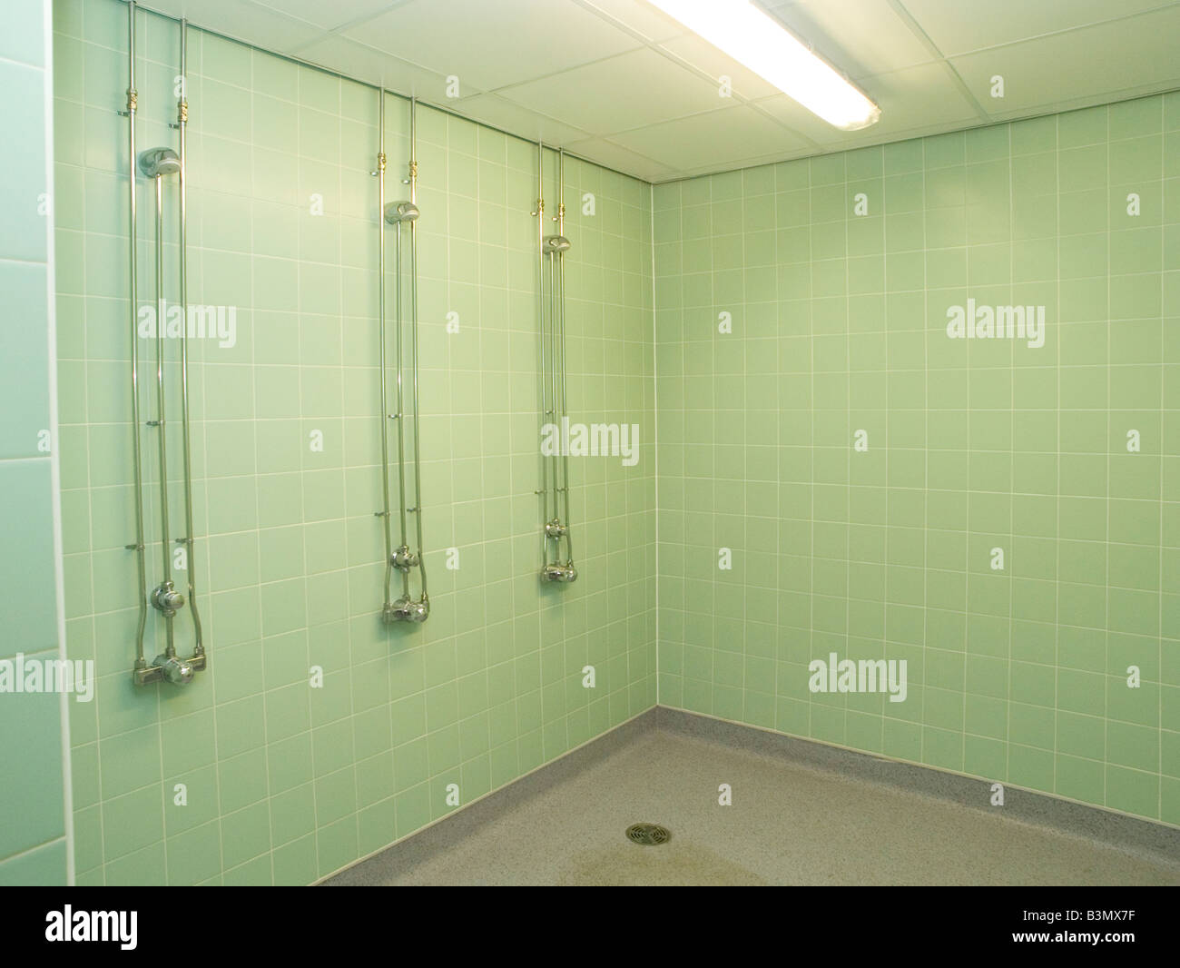 Clean and modern tiled shower facilities at a local leisure centre