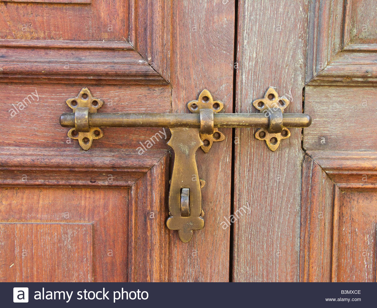 Old Sliding Door Latch On Vintage Hardwood Door Stock Photo