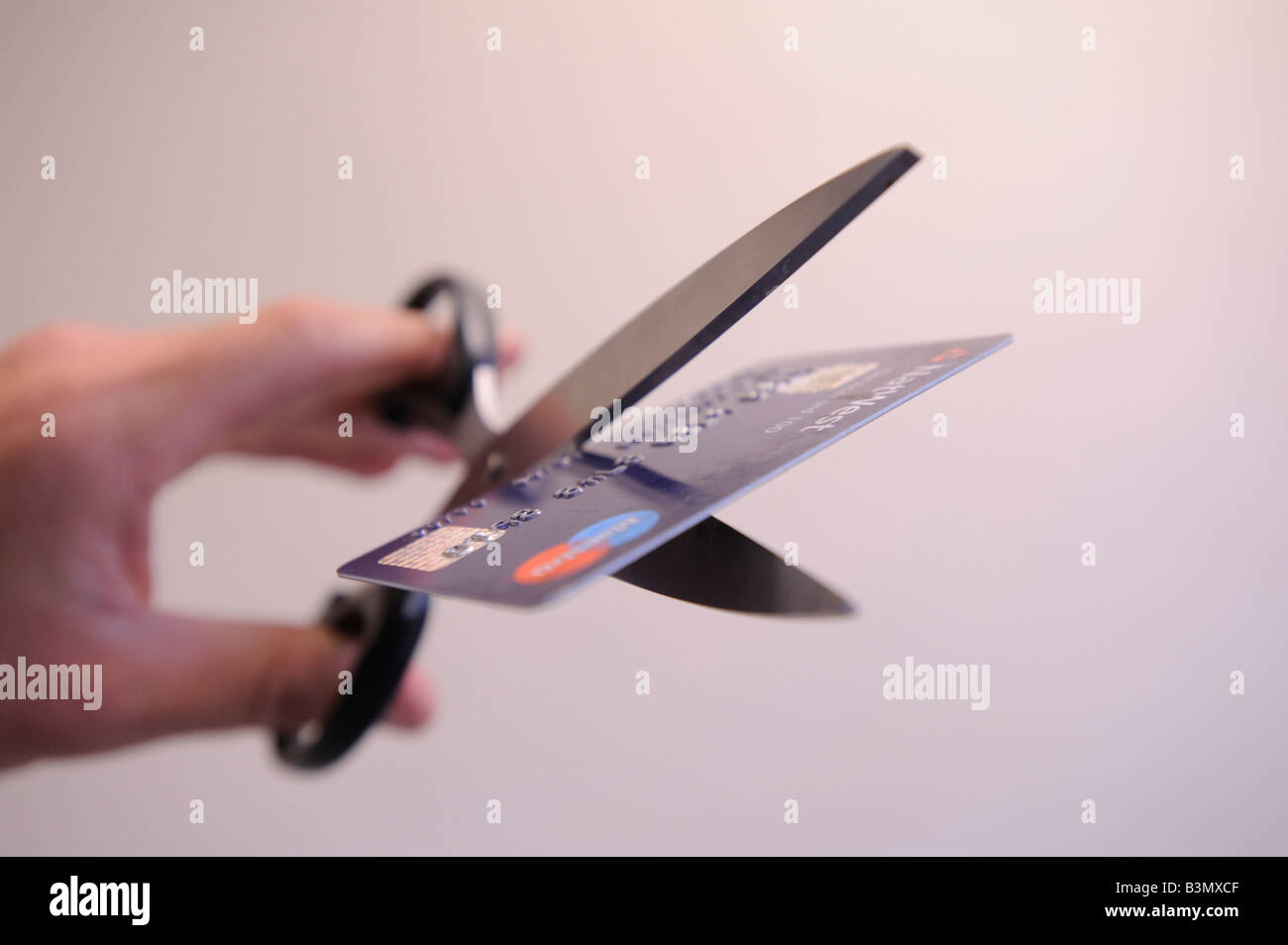 Cutting up credit card Stock Photo Alamy