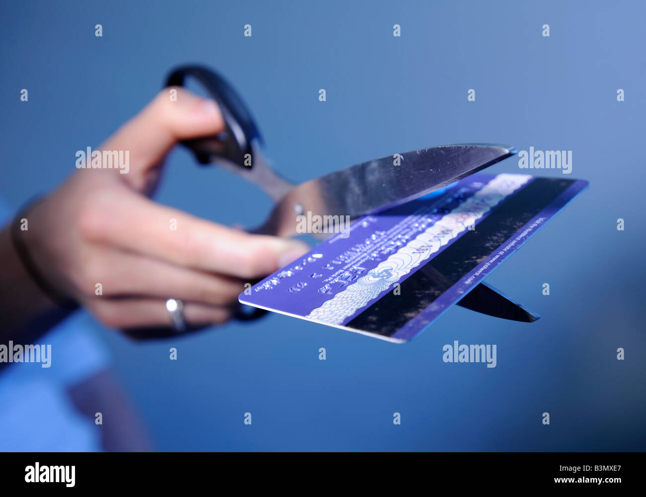 Cutting up credit card Stock Photo Alamy