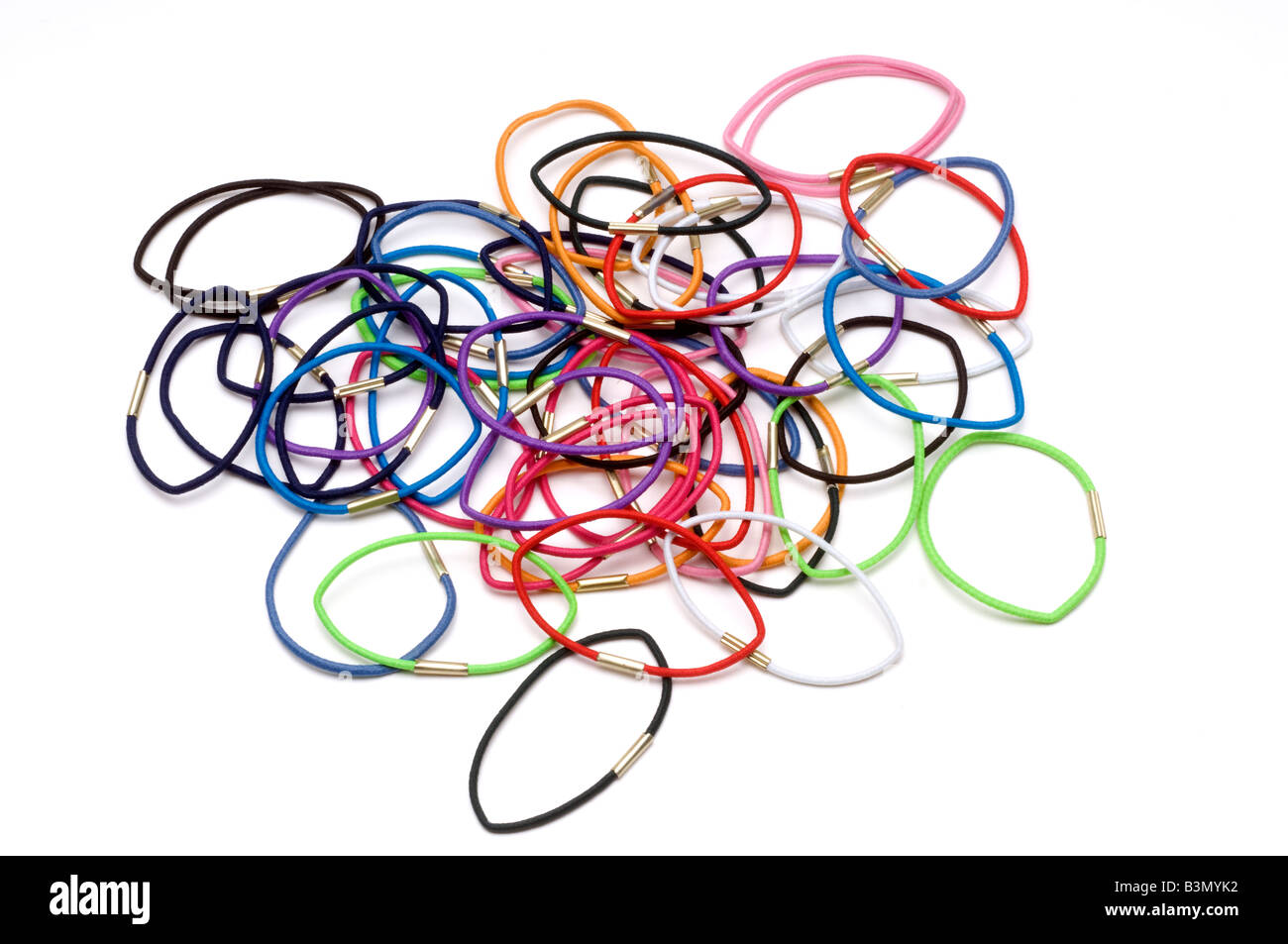 Pile of multicoloured elastic hair bands Stock Photo