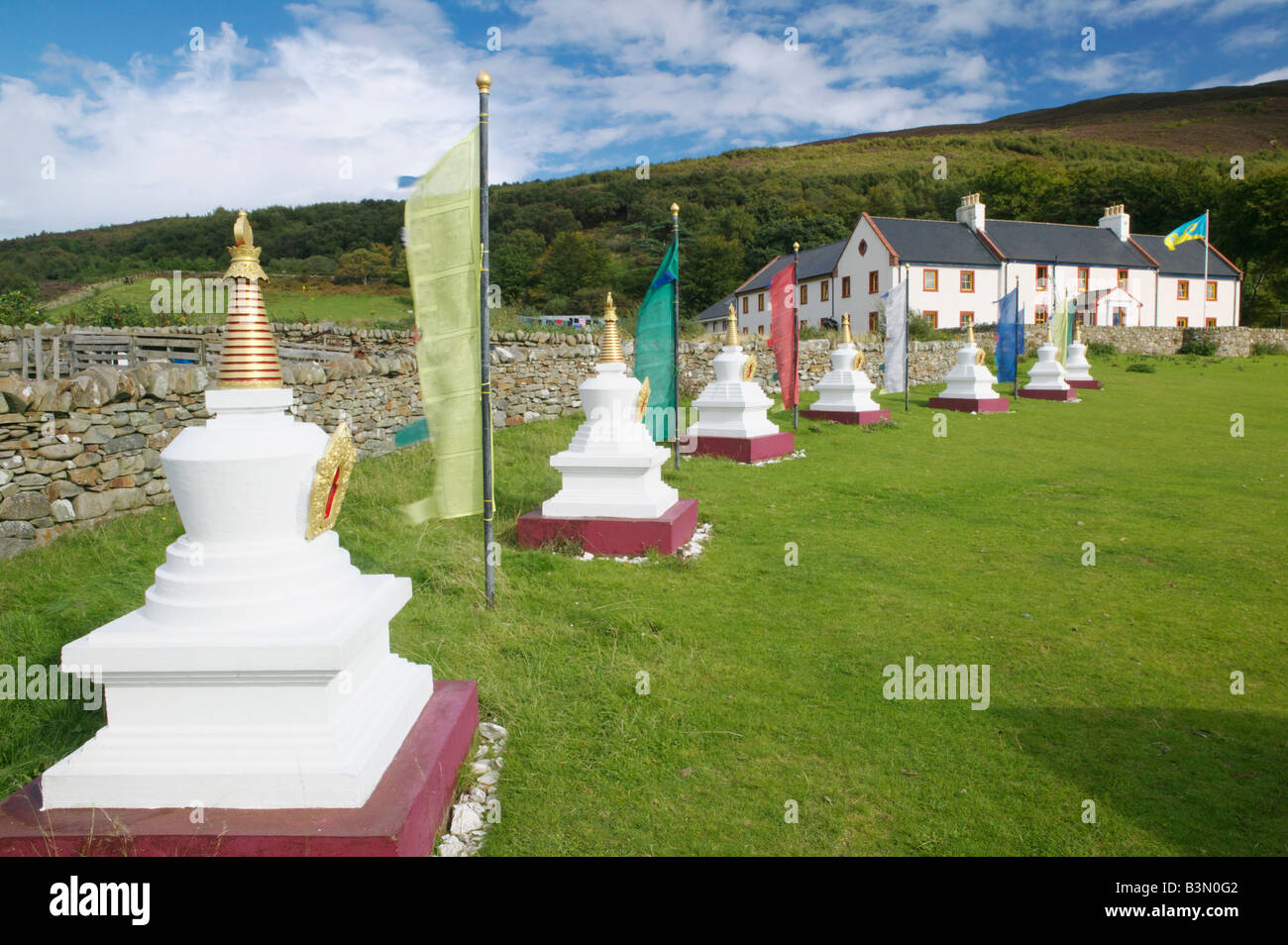 Stupas and Prayer flags at the Centre for World Peace and Health, Holy Island, Isle of Arran, North Ayrshire, Scotland, UK. Stock Photo