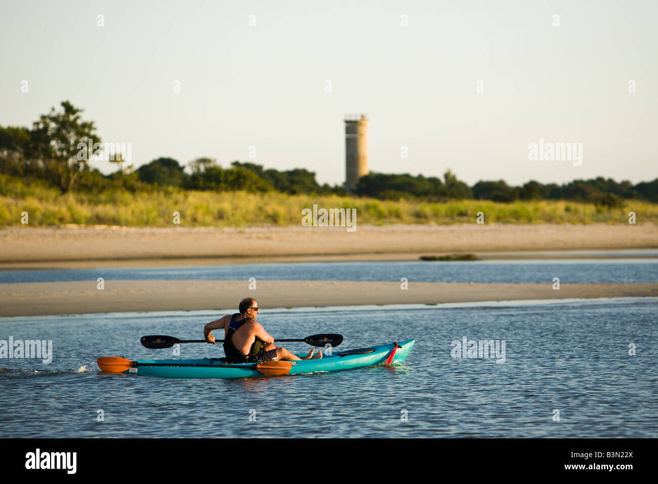 Kayaking in the Delaware bay with restored WWII observation tower from