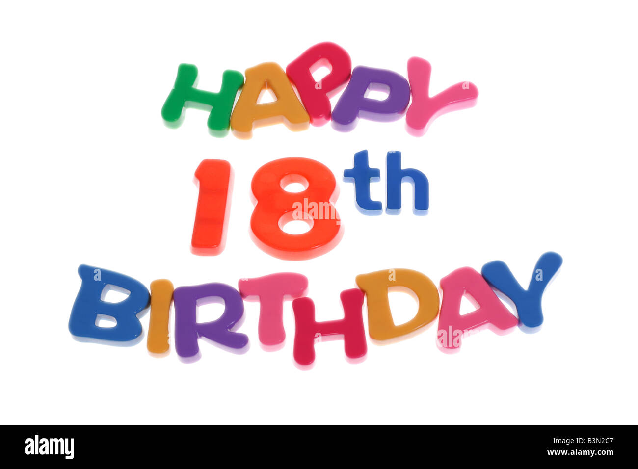 Happy 18th Birthday letter blocks arranged on white background Stock Photo