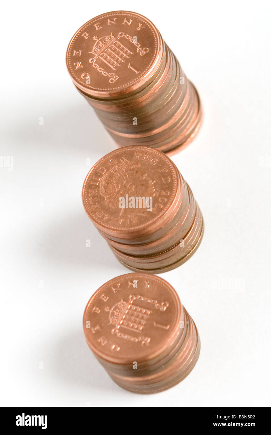 3 piles of 1 pence pieces Stock Photo