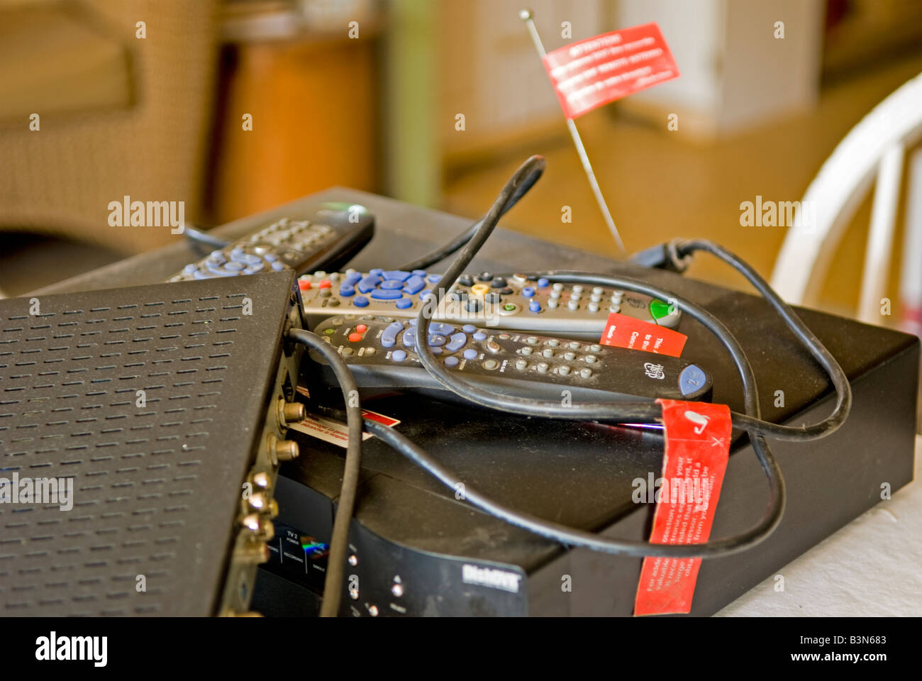 Canceling the cable - satellite equipment ready to go back - good signs of economic instability. Stock Photo