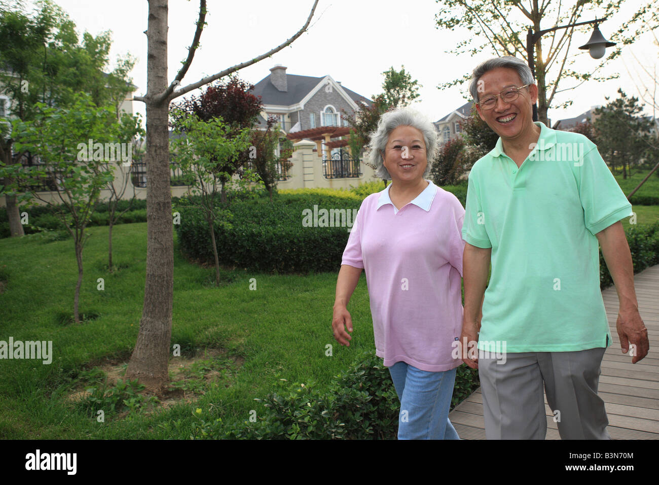 chinese senior couple walking outdoors,beijing,china Stock Photo - Alamy