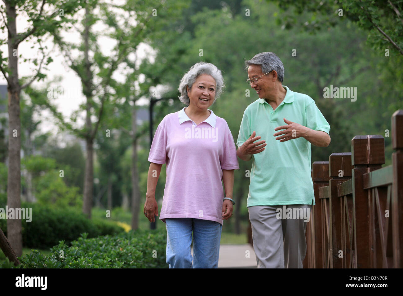 chinese senior couple walking outdoors,beijing,china Stock Photo - Alamy