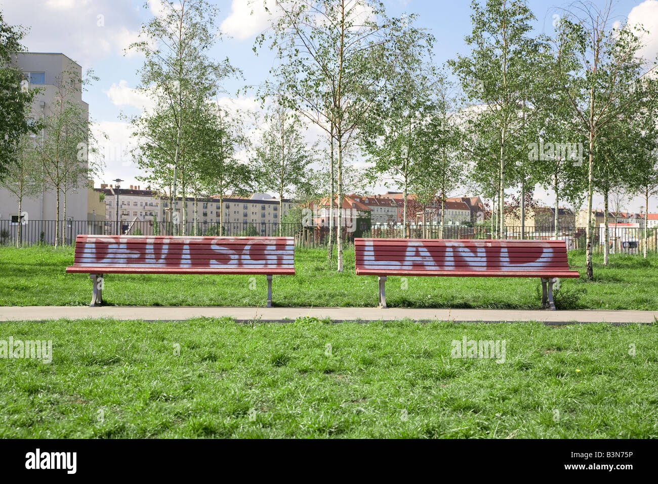 2 wooden bench s in Berlin with the word Deutschland Germany written across them Stock Photo