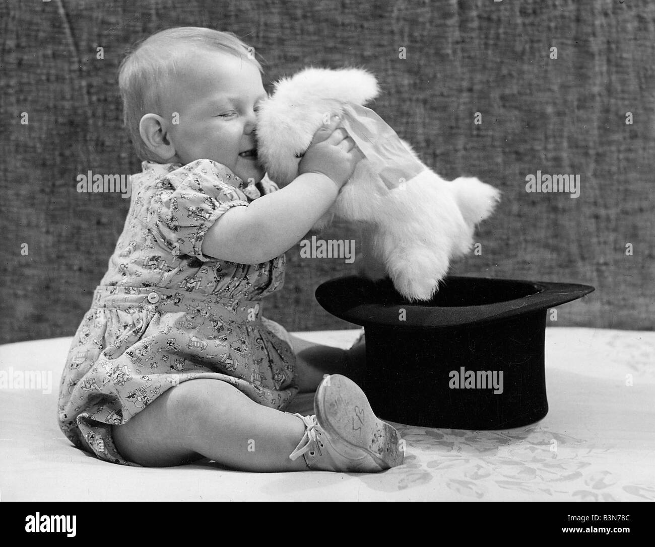 BABY PLAYING Stock Photo