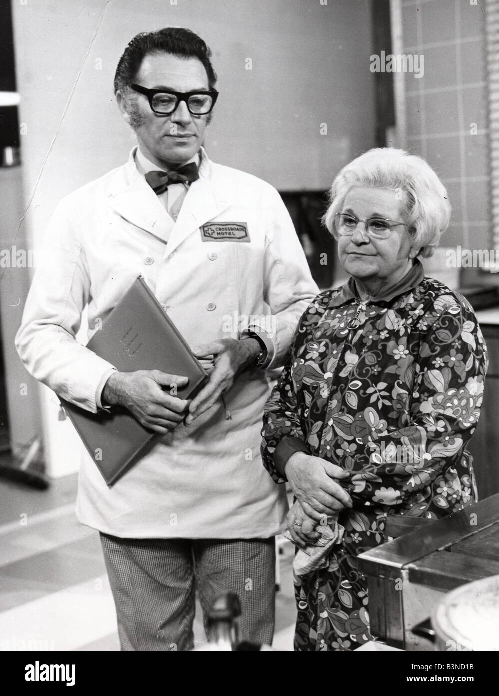 CROSSROADS   ATV UK TV  series that ran from 1964 to 1988 David Lawton as Chef Bernard Booth and Ann George as Amy Turtle Stock Photo
