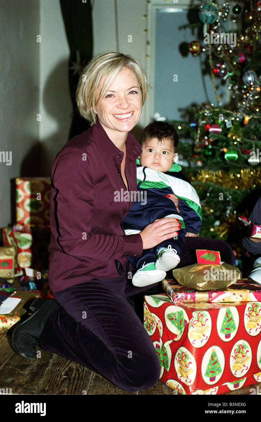 Mariella Frostrup TV Presenter Film Critic December 1997 Handing out christmas presents at the Refugee council s karibu center in london donated by the body shop and others Stock Photo