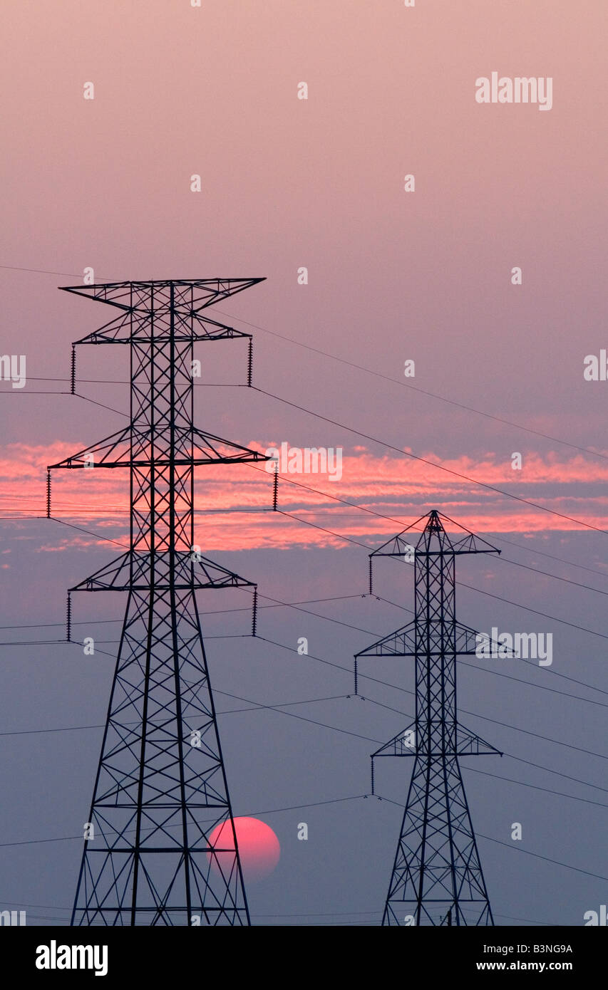 High voltage electric transmission lines at sunset in Boise Idaho Stock