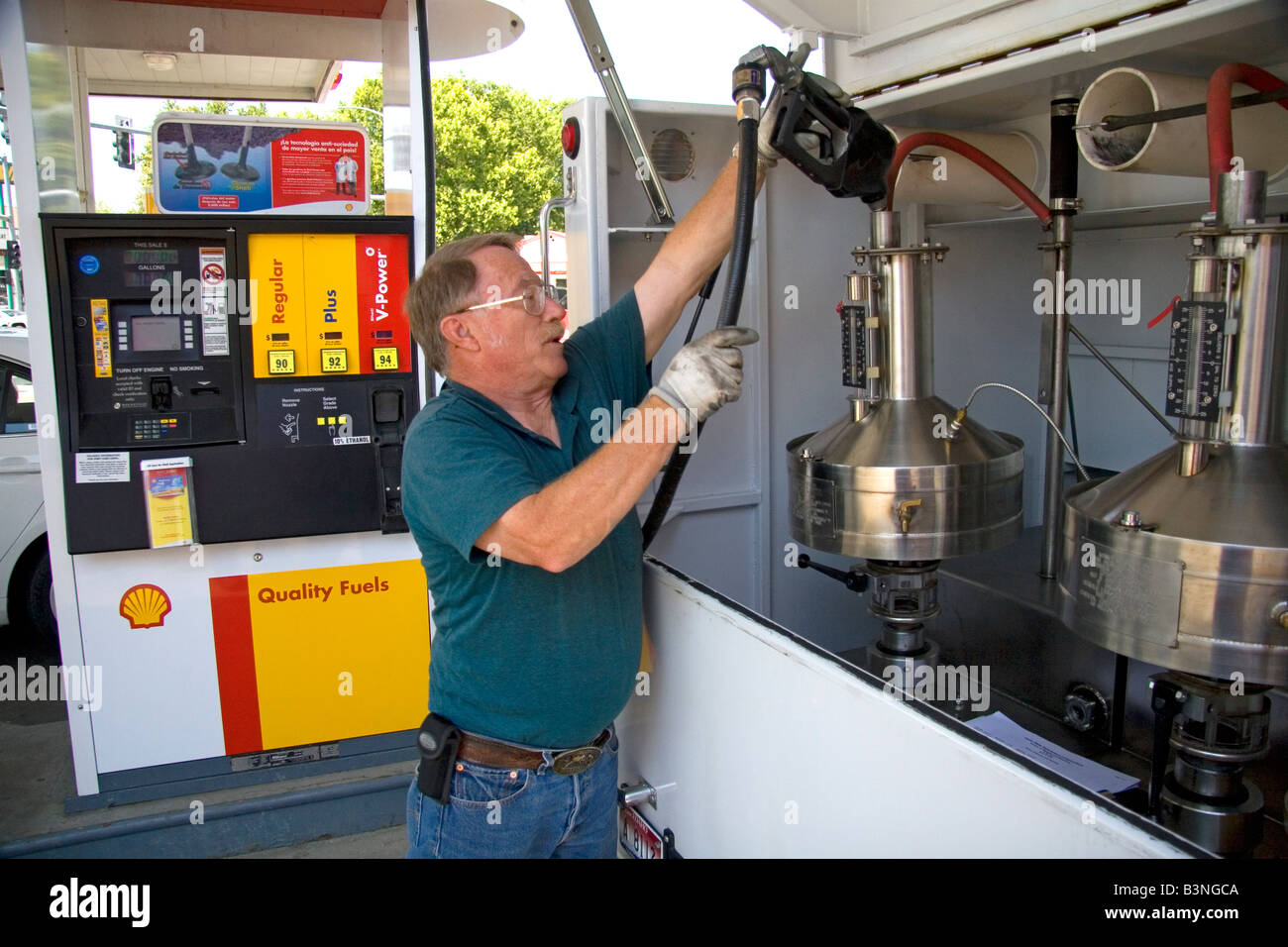 Bureau of Weights and Measures inspector testing gasoline octane rating and gas pump accuracy in Boise Idaho Stock Photo