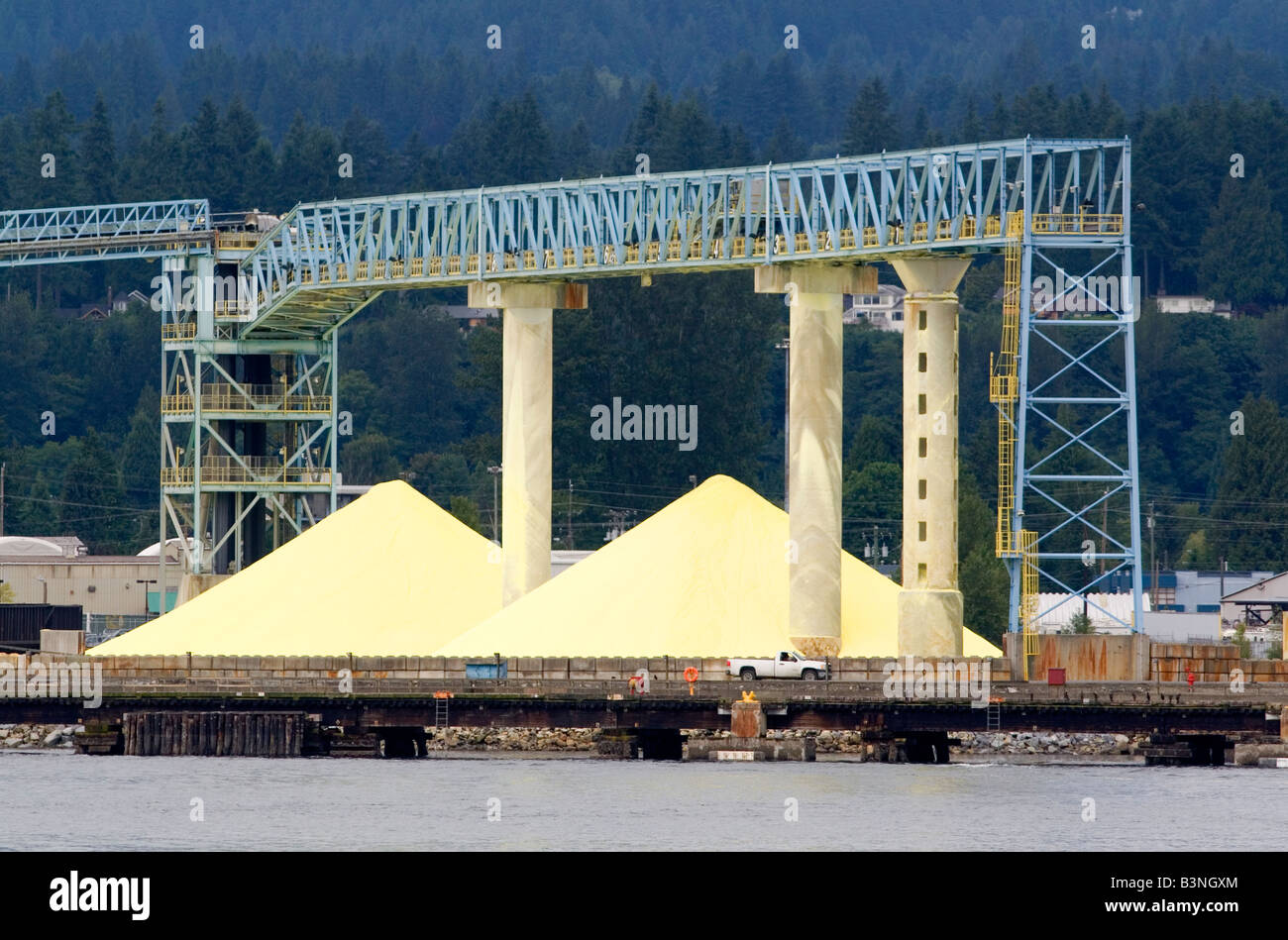 Sulfur recovered from hydrocarbons stockpiled for shipment at Port Vancouver British Columbia Canada Stock Photo