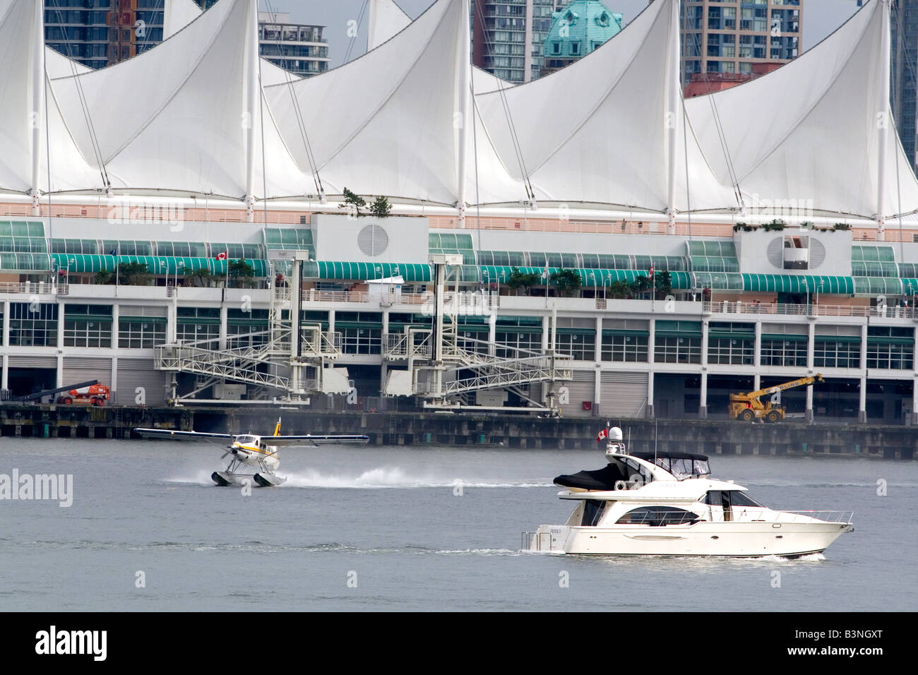 Seaplane and boat in front of Canada Place in Vancouver British Columbia Canada Stock Photo
