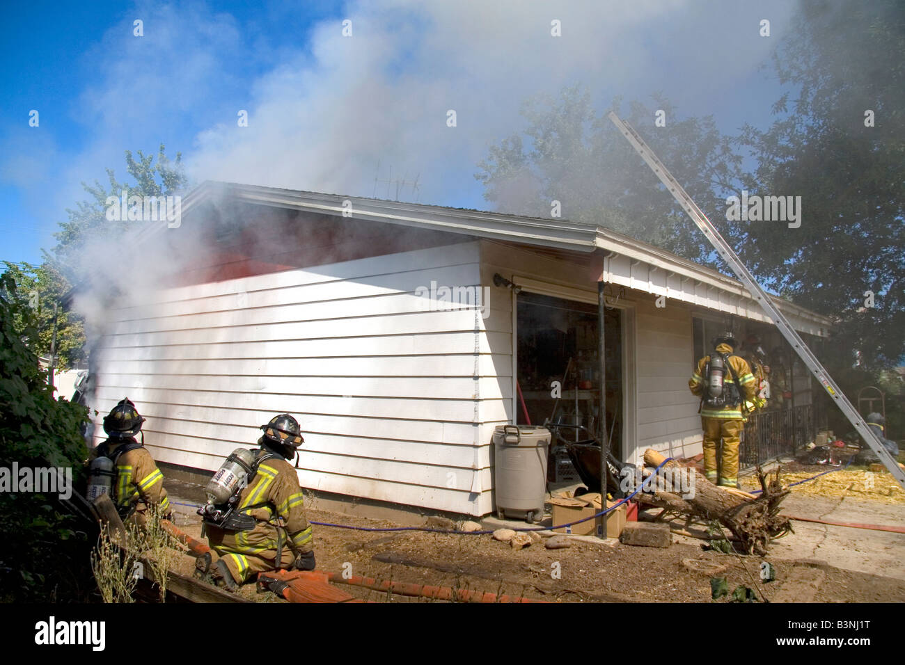 Firefighters respond to a house fire in Boise Idaho Stock Photo - Alamy