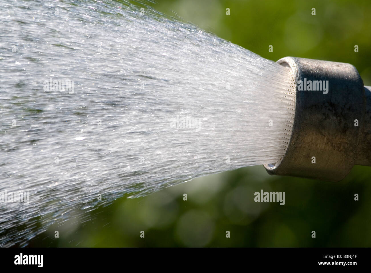 Water coming out of a sprinkler head Stock Photo Alamy