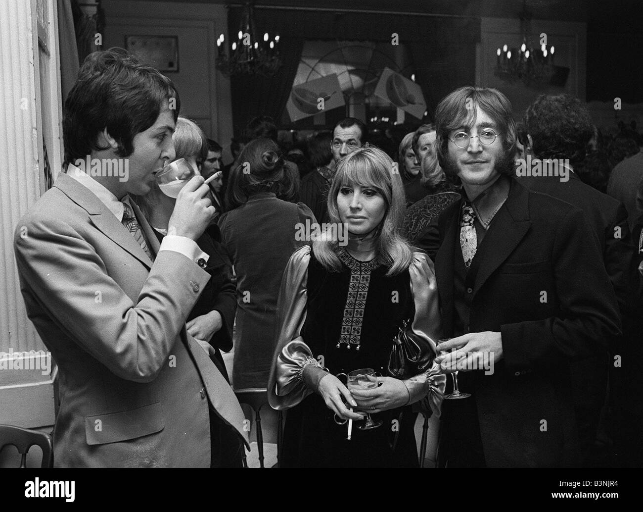 John Lennon with wife Cynthia and Paul McCartney of the pop group The ...