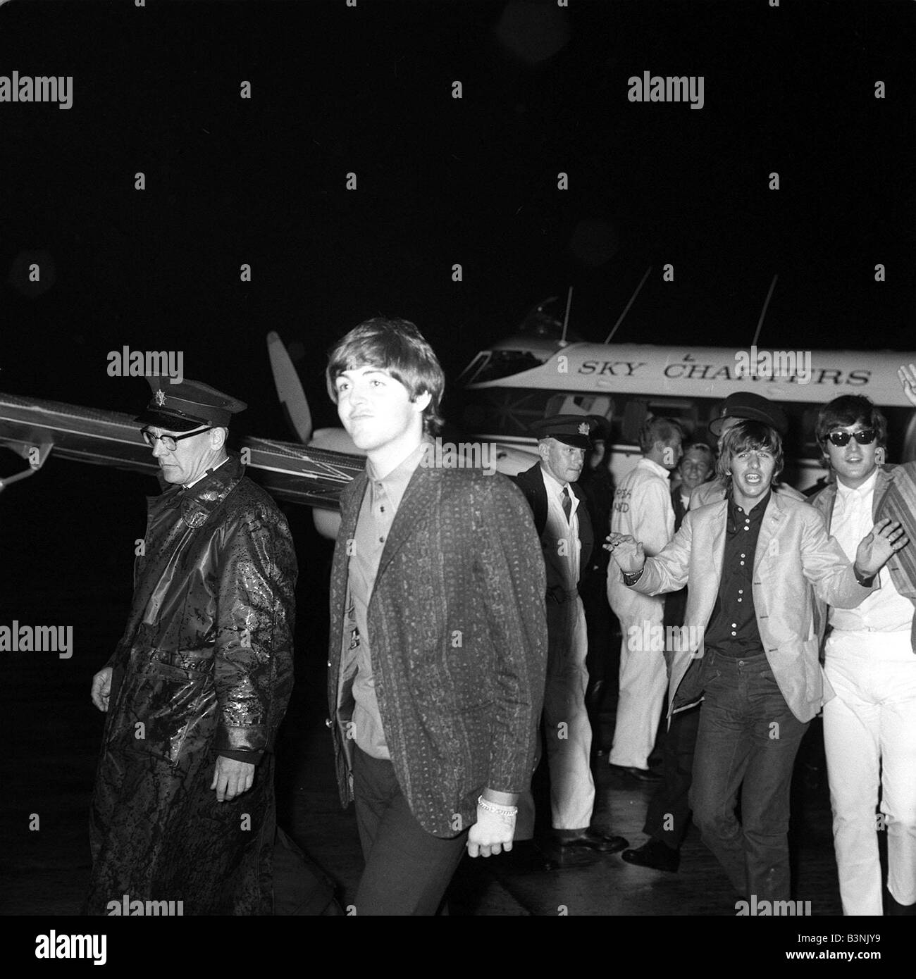 The Beatles July 1964 John Lennon and Paul McCartney and Ringo Starr at Blackpool Airport Stock Photo