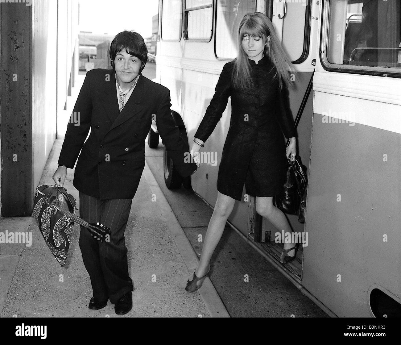 Paul McCartney of the Beatles and girlfriend Jane Asher get off the bus ...