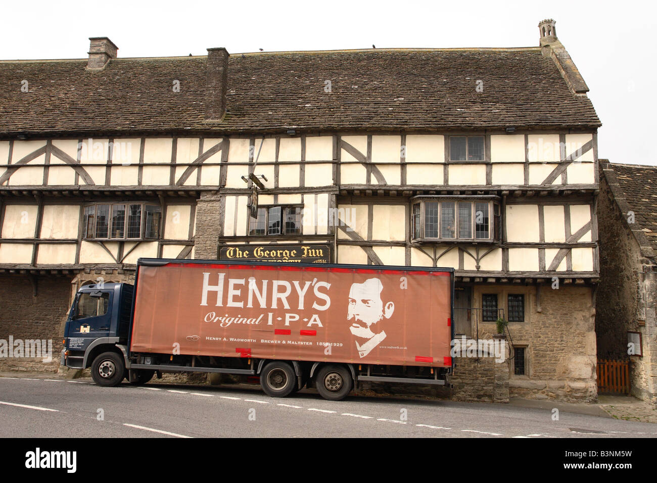 Wadworth brewery beer delivery lorry outside The pub inn in
