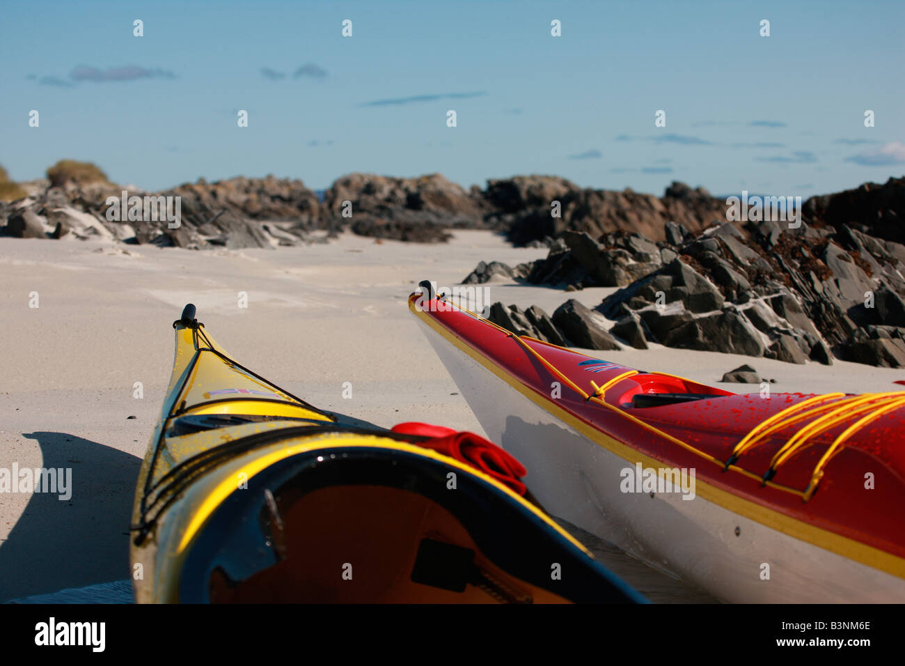 Two kayaks on the beach Stock Photo - Alamy
