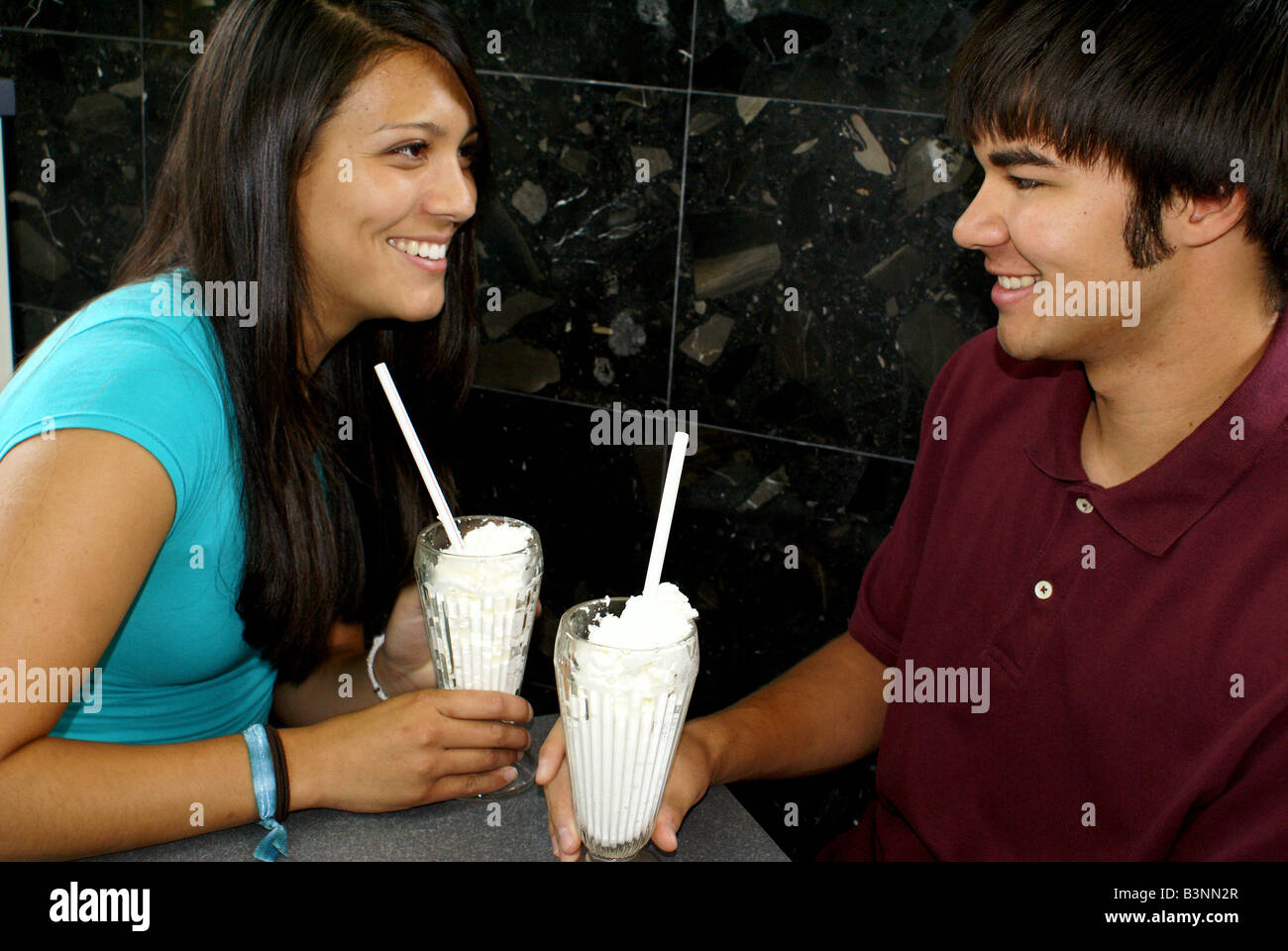 Young black couple chatting hi-res stock photography and images - Alamy