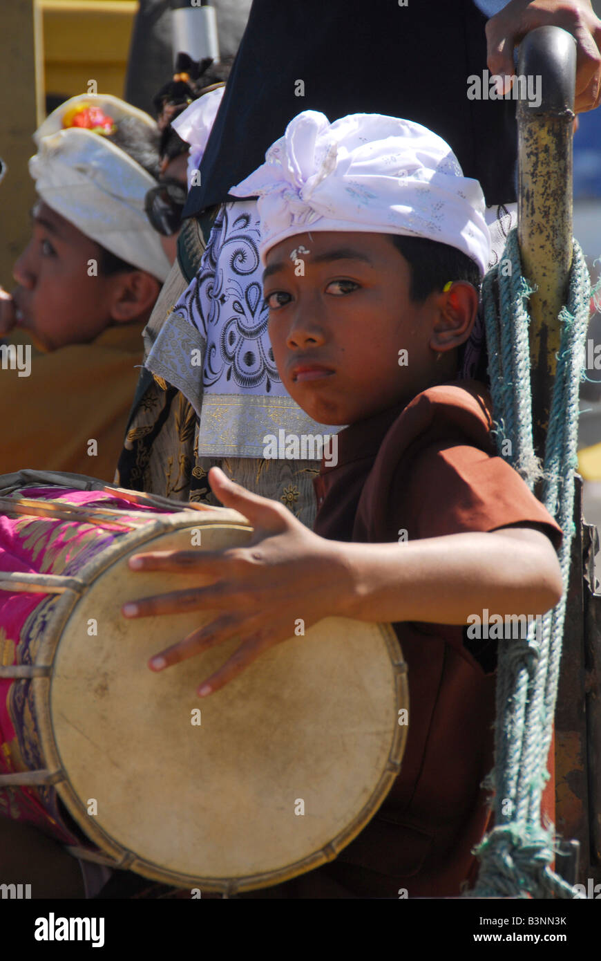 young boy playing the drum, cremation ceremony /final ritual, kusamba ...