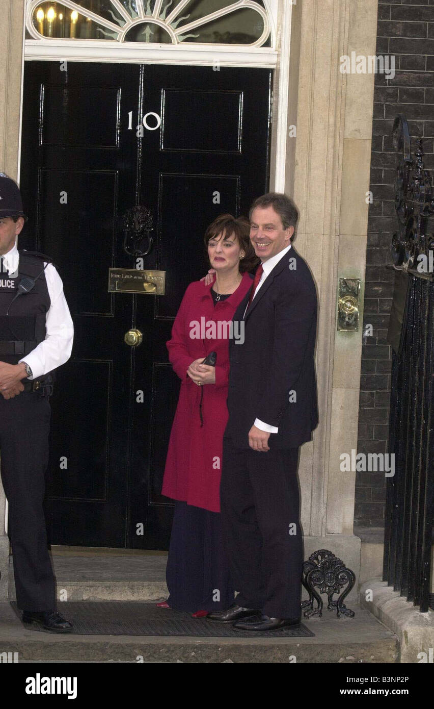 Britain s Prime Minister Tony Blair with his wife Cherie Blair arrive