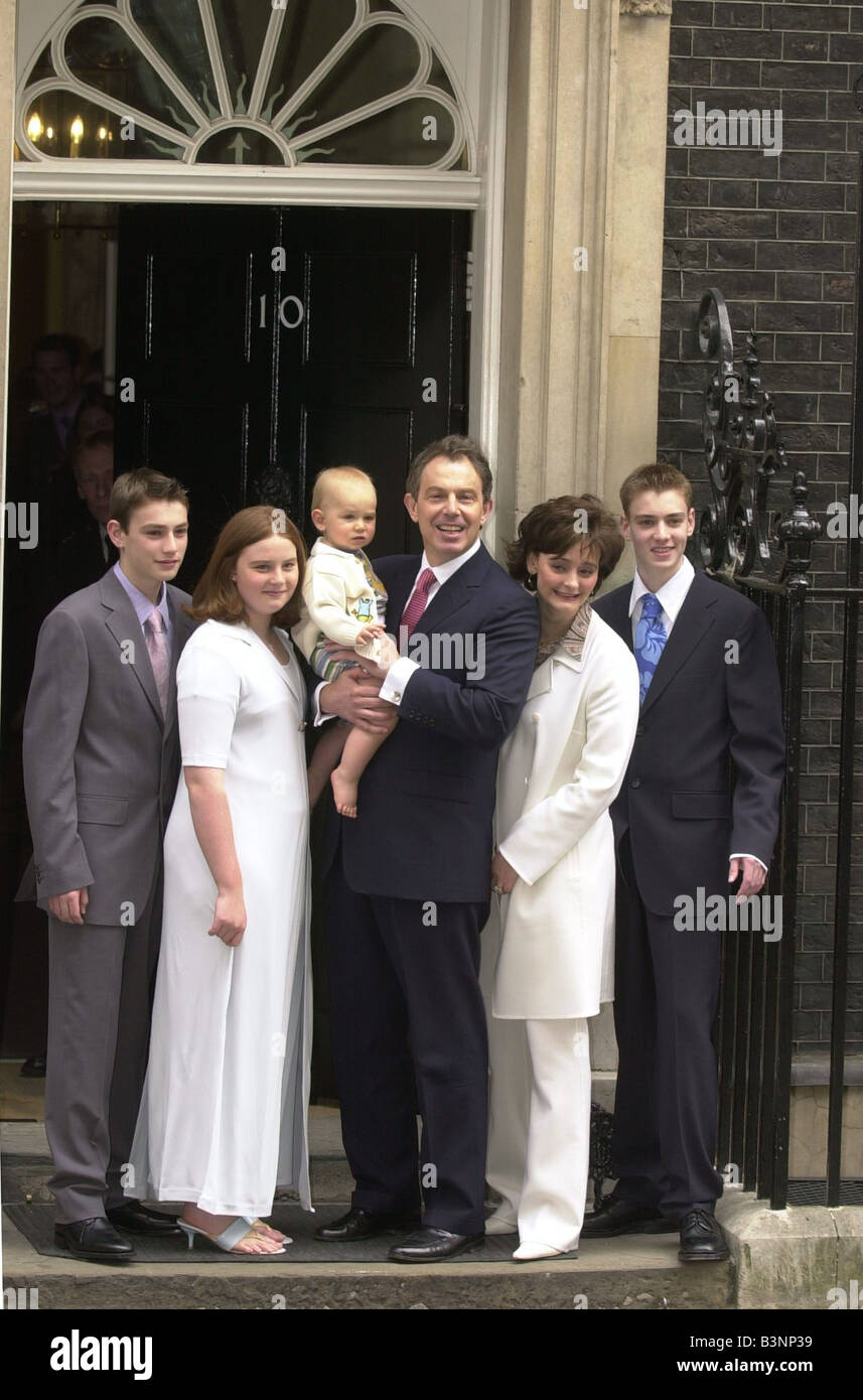 Prime Minister Tony Blair with his family Nicholas L Kathryn 2L infant Leo Cherie 2R and Euan R stand outside No10 Downing Street June 2001 celebrating the election win Stock Photo