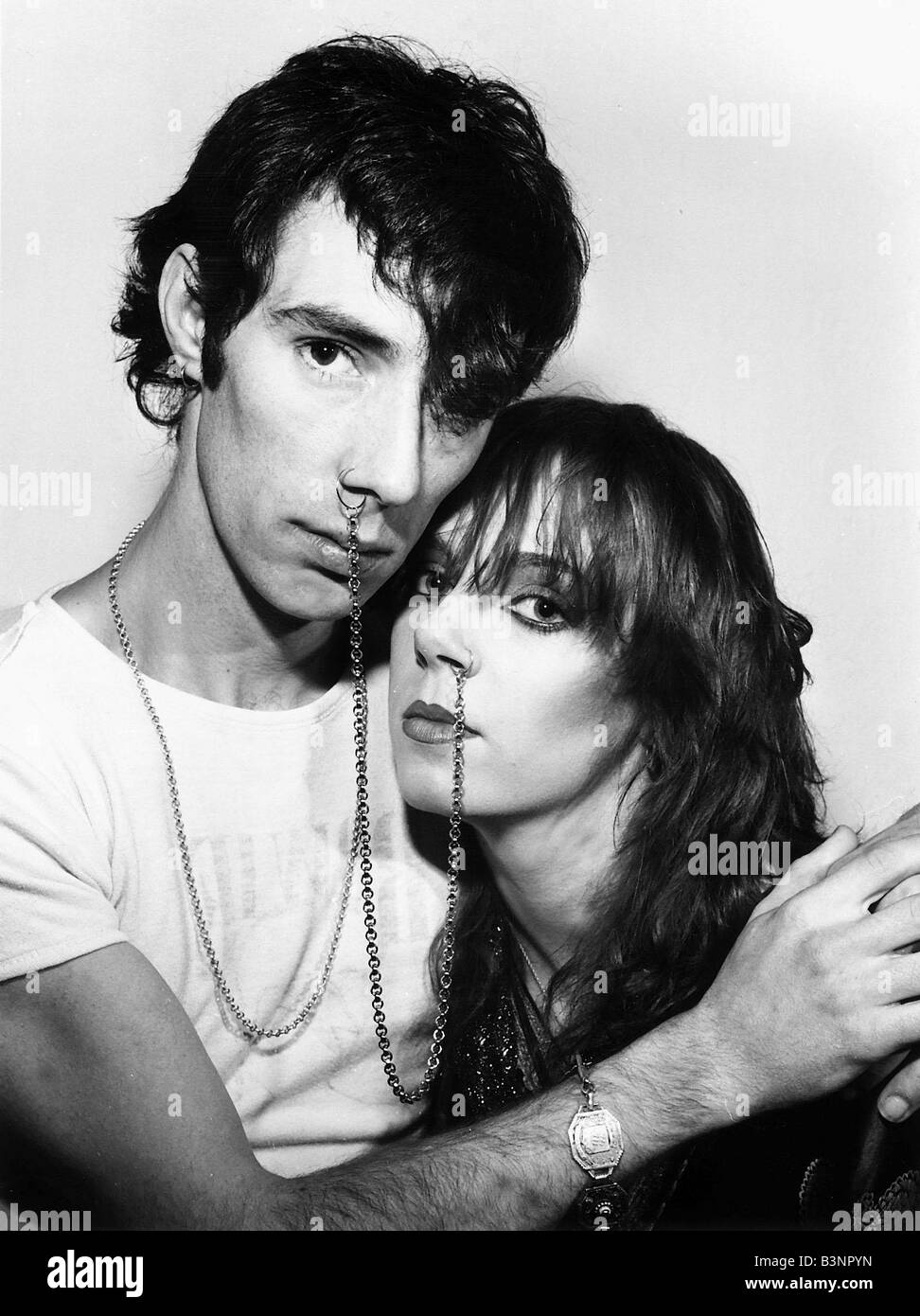 Phil Jones punk singer and girlfriend Mandy Todd 1982 pop group Afraid of Mice Nose rings linked by chain Stock Photo