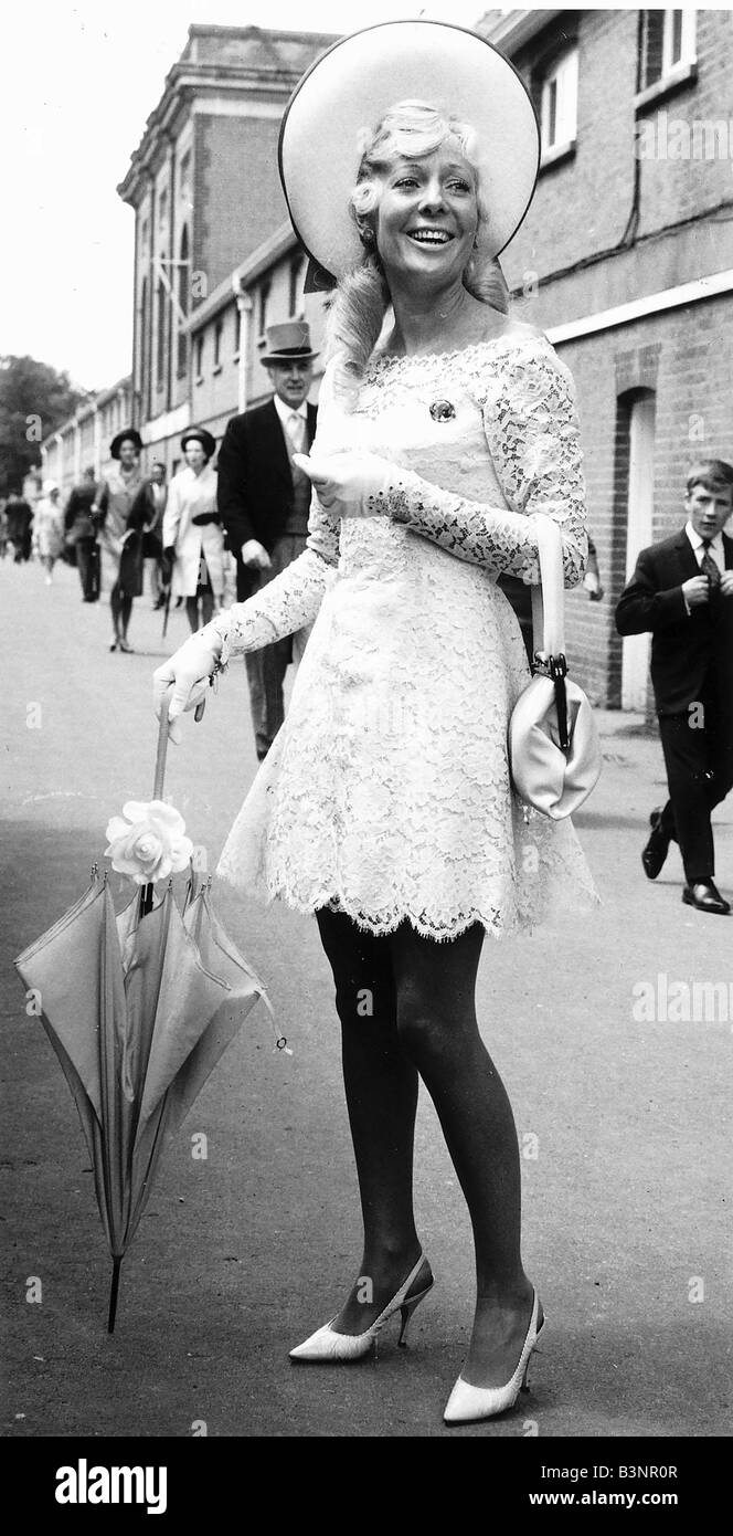 Shirley Moore in white lace mini dress at Royal Ascot June 1969 Sixties fashion Stock Photo