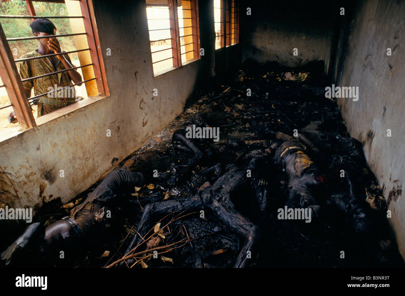 Tutsi school children burned to death in the office of the petrol station in Kibimba on the day after the coup Stock Photo